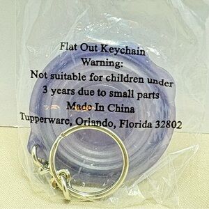 Tupperware Flat Out Keychain. Collectible and rare. Vintage